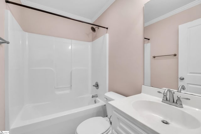 bathroom featuring ornamental molding, bathing tub / shower combination, toilet, and vanity