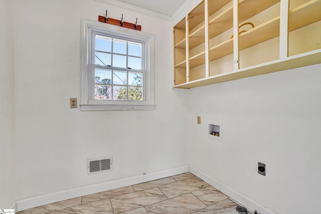 clothes washing area featuring laundry area, marble finish floor, visible vents, and baseboards