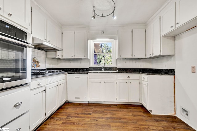 kitchen featuring white cabinets, dark wood-style floors, stainless steel appliances, and a sink