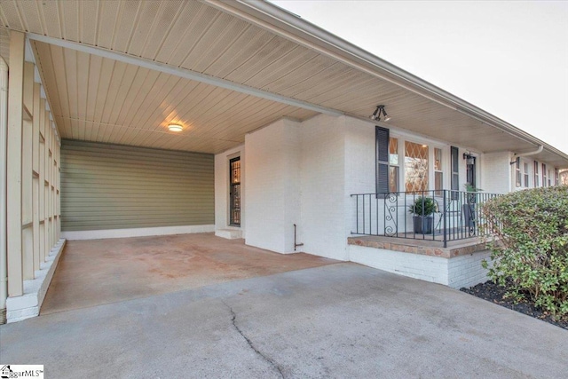 exterior space featuring an attached carport