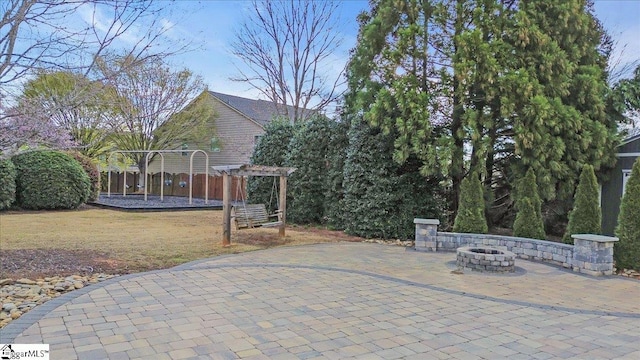 109 Macintyre St, Simpsonville, SC 29680 - view of patio featuring an outdoor fire pit