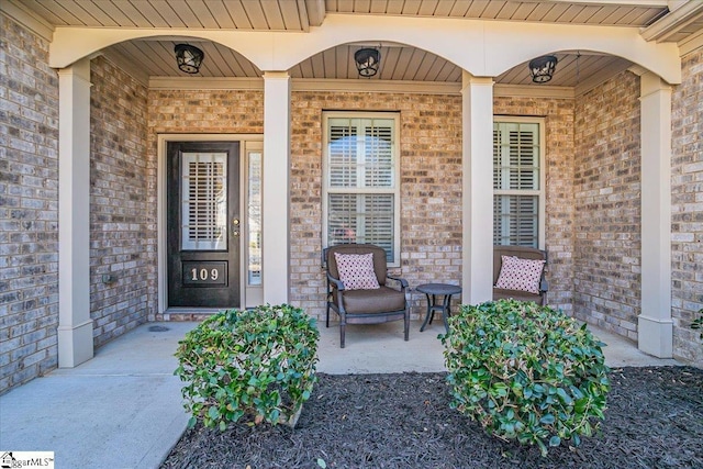109 Macintyre St, Simpsonville, SC 29680 - doorway to property with covered porch and brick siding