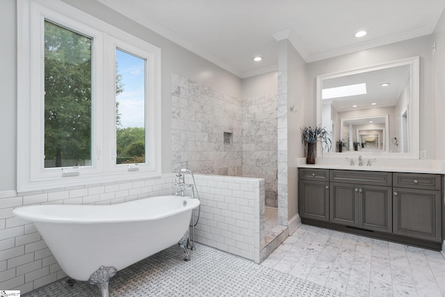 bathroom featuring ornamental molding, walk in shower, a freestanding bath, vanity, and tile walls