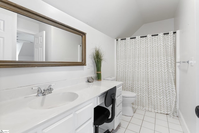 bathroom with lofted ceiling, curtained shower, toilet, vanity, and tile patterned floors