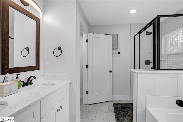 full bath featuring a garden tub, a sink, marble finish floor, double vanity, and a stall shower