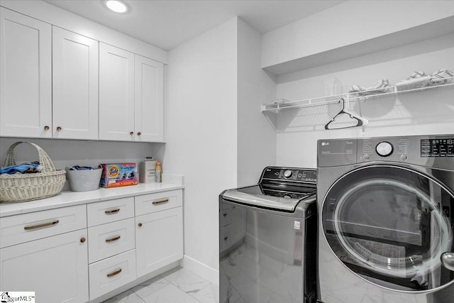 laundry area with cabinet space, baseboards, independent washer and dryer, marble finish floor, and recessed lighting