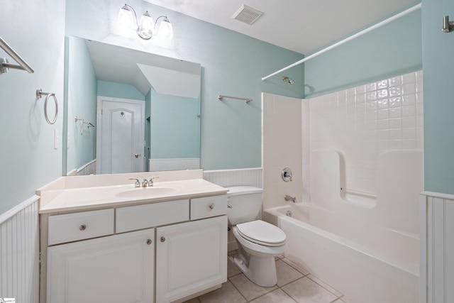 full bathroom with visible vents, toilet, a wainscoted wall, tile patterned floors, and vanity