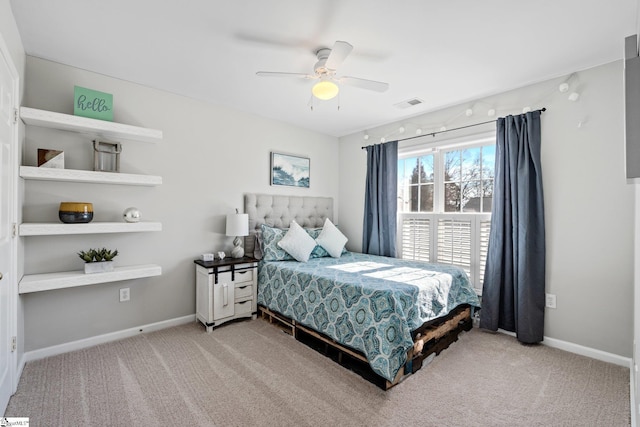 bedroom featuring carpet flooring, visible vents, and baseboards