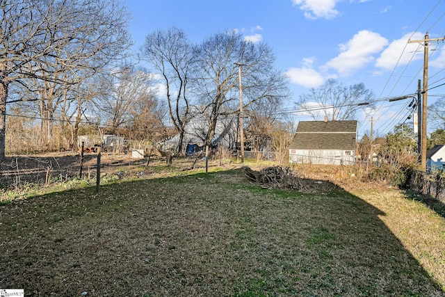 view of yard featuring fence