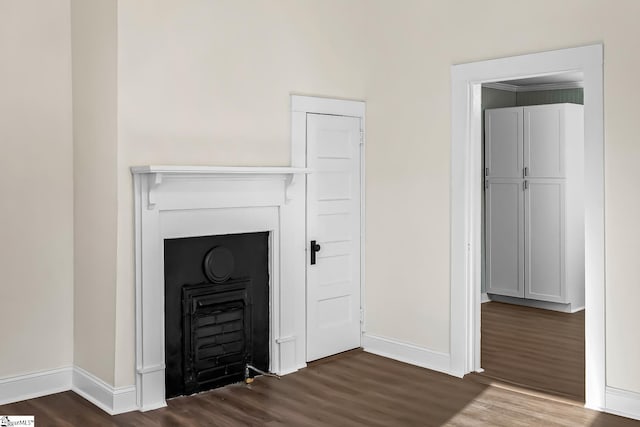 interior space with dark wood-style floors and baseboards