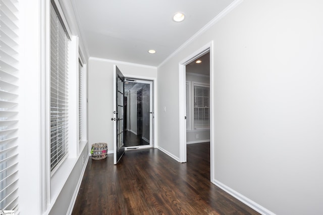 hall with recessed lighting, crown molding, baseboards, and wood finished floors