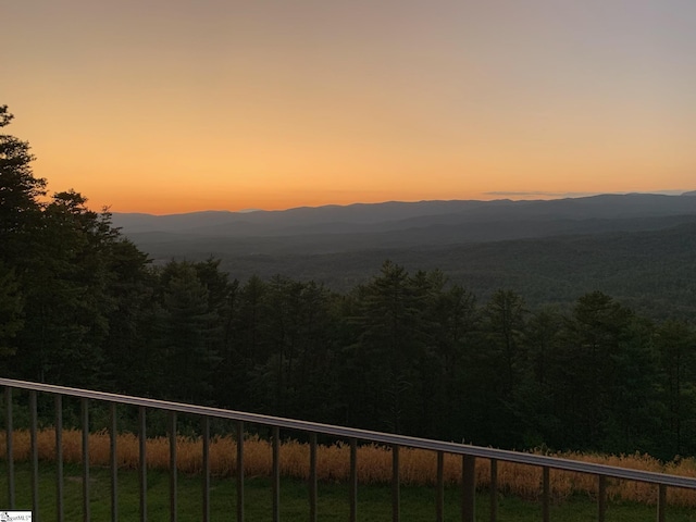 mountain view featuring a view of trees