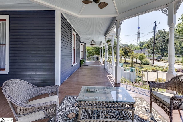 view of patio / terrace featuring a ceiling fan and covered porch