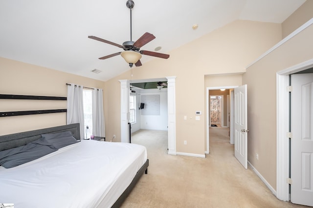 bedroom with lofted ceiling, light colored carpet, ceiling fan, and baseboards