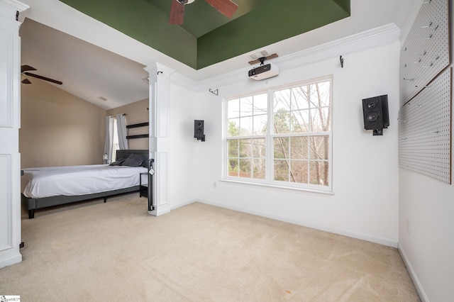 unfurnished bedroom featuring ornate columns, baseboards, vaulted ceiling, and light colored carpet