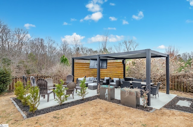 view of patio featuring an outdoor hangout area and fence