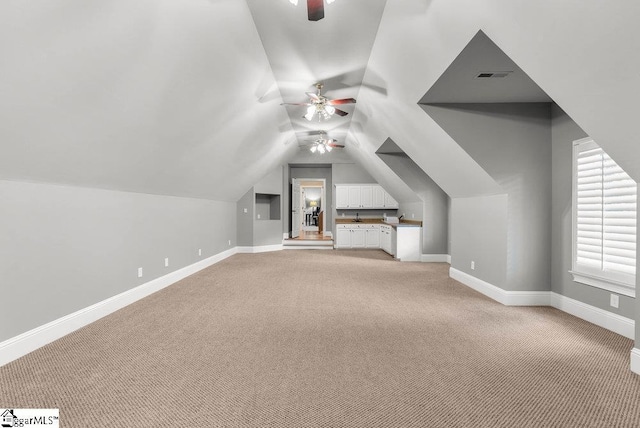 1212 Stillwater Dr, Seneca, SC 29678 - additional living space featuring lofted ceiling, light colored carpet, a ceiling fan, baseboards, and visible vents