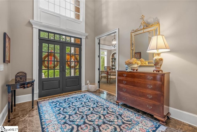 1212 Stillwater Dr, Seneca, SC 29678 - foyer entrance with french doors, stone finish floor, a towering ceiling, and baseboards