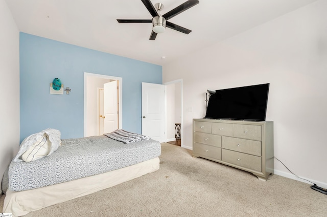 bedroom featuring ceiling fan, carpet floors, and baseboards