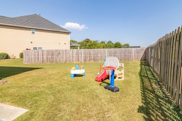 view of yard with a fenced backyard