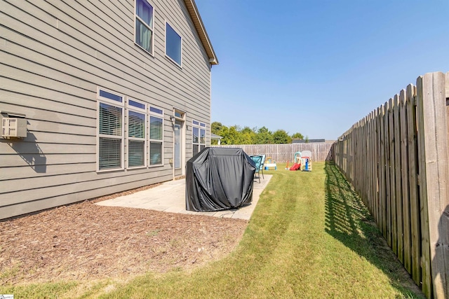 view of yard featuring a patio area and a fenced backyard