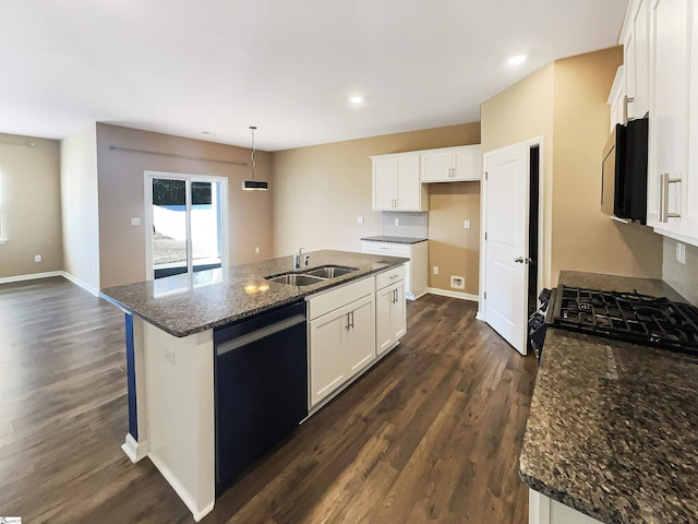 kitchen with white cabinets, black appliances, dark wood-type flooring, and a sink