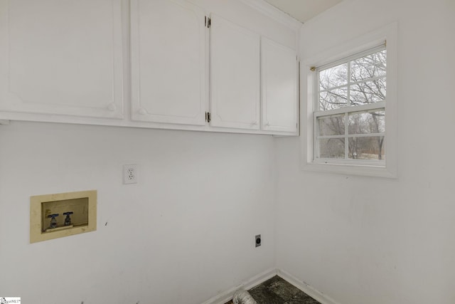 washroom featuring cabinet space, baseboards, washer hookup, and hookup for an electric dryer