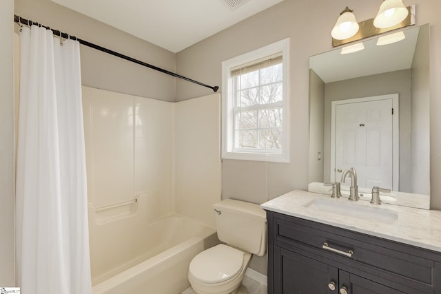 bathroom featuring toilet, shower / tub combo, and vanity