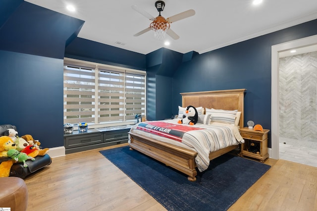 bedroom featuring baseboards, wood finished floors, visible vents, and recessed lighting