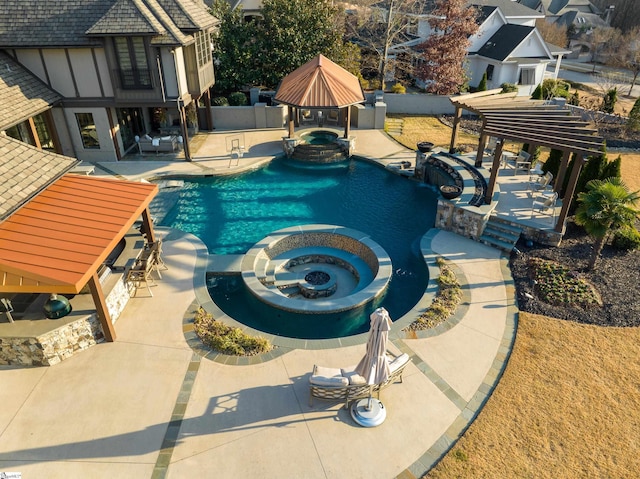 view of swimming pool with a gazebo, a patio area, a fenced backyard, and a pool with connected hot tub