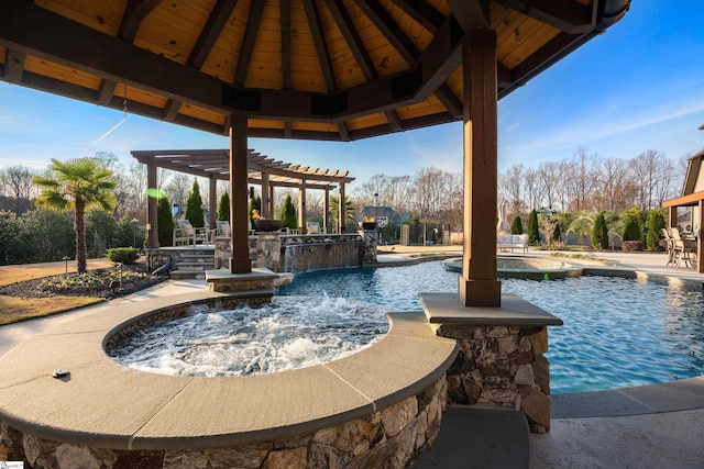 outdoor pool featuring a patio area, a gazebo, a pergola, and an in ground hot tub