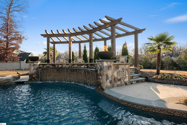 view of swimming pool featuring a pergola