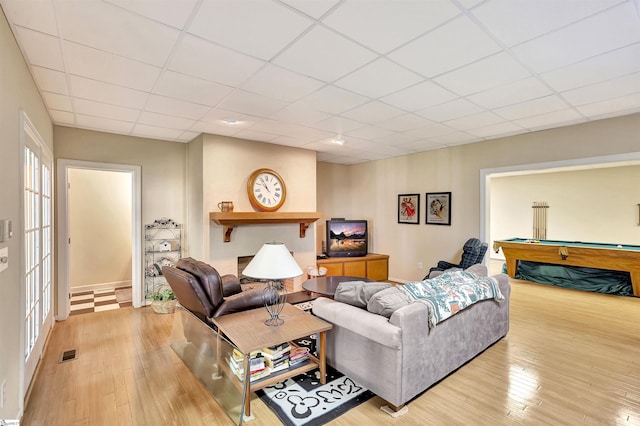 living area featuring a drop ceiling, billiards, visible vents, and light wood finished floors