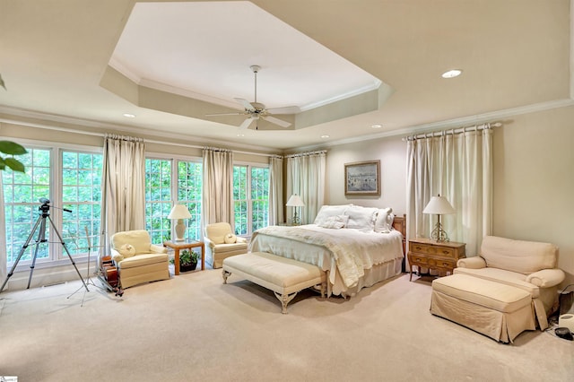 bedroom featuring ornamental molding, carpet flooring, a raised ceiling, and recessed lighting