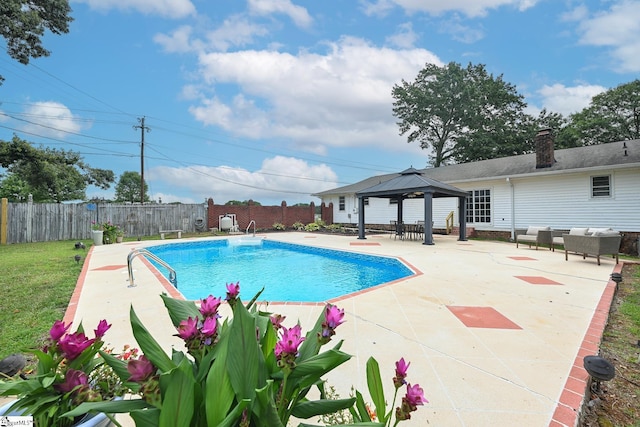 view of pool featuring a fenced in pool, a yard, a gazebo, a patio area, and a fenced backyard