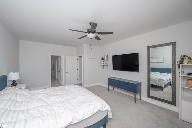 bedroom with carpet flooring, ceiling fan, and baseboards