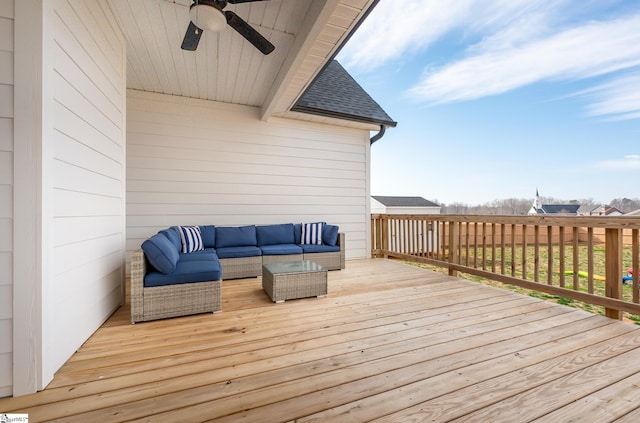 wooden deck featuring ceiling fan and an outdoor hangout area