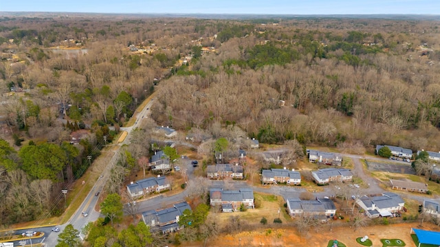 bird's eye view featuring a view of trees