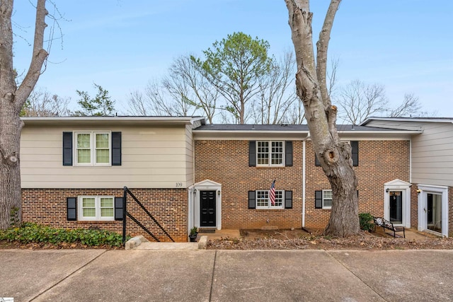 view of front of property with brick siding