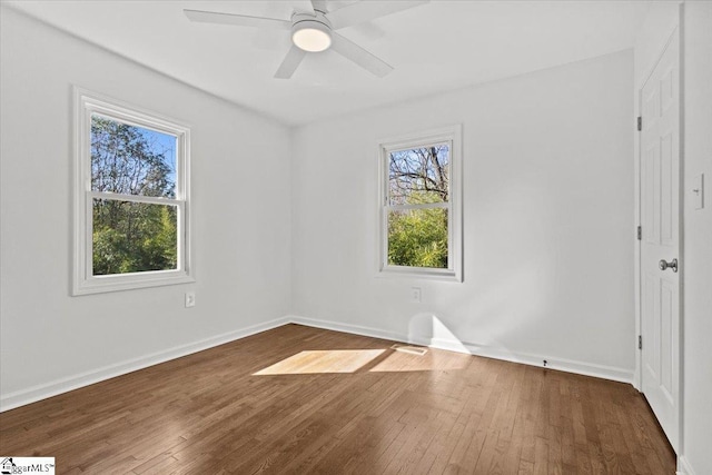 unfurnished bedroom featuring ceiling fan, wood finished floors, and baseboards