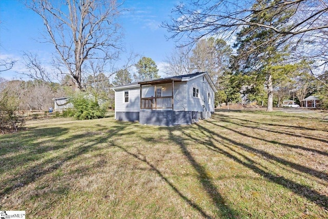 exterior space featuring a yard