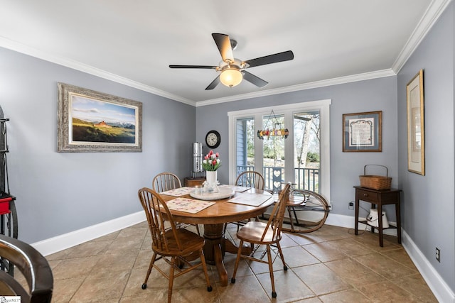 dining room featuring crown molding, baseboards, and ceiling fan