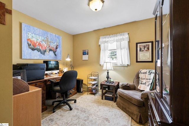 office area featuring baseboards