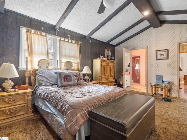 bedroom featuring a textured ceiling, lofted ceiling with beams, carpet flooring, and wallpapered walls