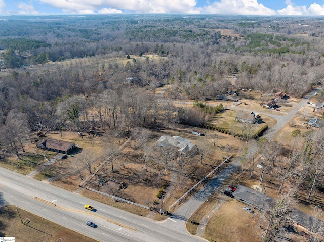 drone / aerial view with a forest view