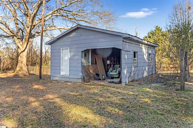 view of outdoor structure with an outdoor structure and fence