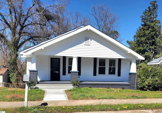 bungalow featuring covered porch