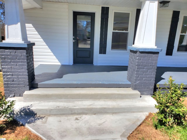 property entrance with a porch