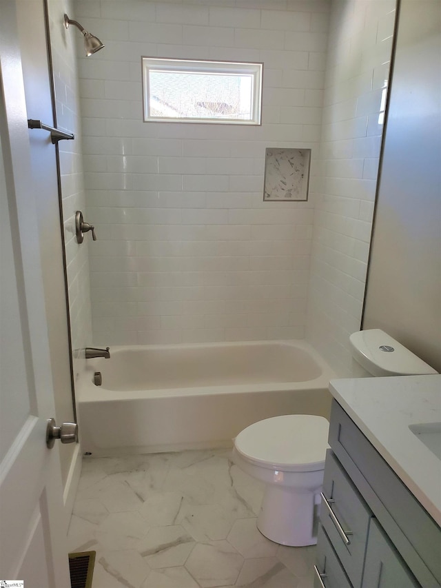 bathroom with shower / tub combination, toilet, visible vents, vanity, and marble finish floor