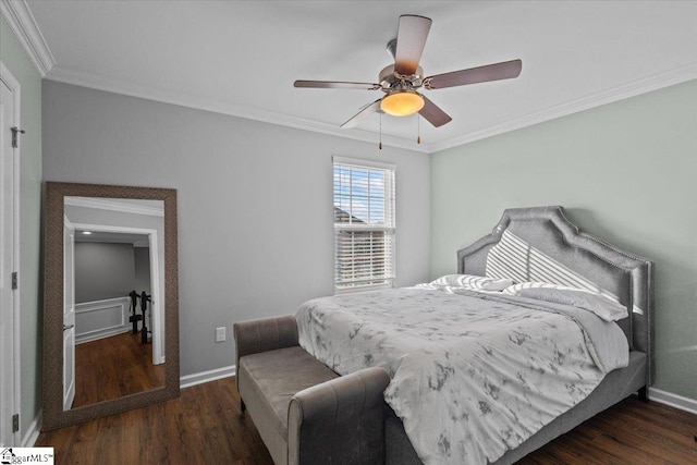 bedroom with ornamental molding, a ceiling fan, baseboards, and wood finished floors